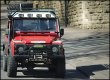 1200874 Heavily modified red Landrover.JPG
