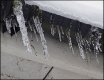 Icicles hanging from guttering DSC01338.JPG