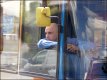 Bus driver talking to colleague while stuck in traffic Exeter DSC00682.JPG Bus driver talking to colleague while stuck in traffic Exeter DSC00682.JPG