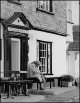 Old woman dozing on pub bench.jpg Old woman dozing on pub bench.jpg