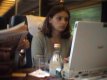 Woman using a laptop on train.jpg