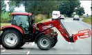 Tractor emerging from side road onto A3052 DSC02893.JPG