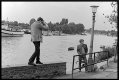 Man on wall photographing boy by Thames Pentacon FM 67-9001.jpg
