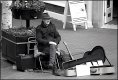 Busker waiting to start New Street Sidmouth GH2 P1320248.JPG Busker waiting to start New Street Sidmouth GH2 P1320248.JPG