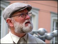 Man with beard flat cap and spectacles Innsbruck Austria S10 NIK_0889.JPG
