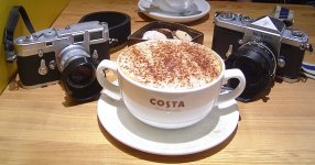 Leica and Nikon with enormous coffee at Costa Cirencester.jpg