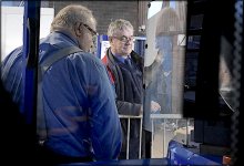 Bus drivers at Exeter watching headlamp replacement GX7 P1140338.JPG