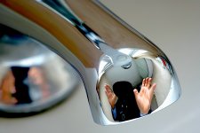 Reflection in a bathroom tap 12CL8270.JPG