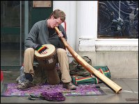 Busker with drum and long horn London E-20P P2100002.jpg Busker with drum and long horn London E-20P P2100002.jpg