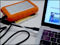 Orange disk drive and MacBook pro TZ70 P1030632.JPG