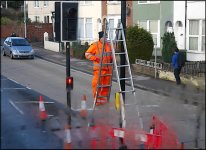 Workman on ladder in middle of road Heavitree Road Exeter GM5 P1230269.JPG