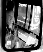 Bus driver in mirrir SL300 DSCF3604 copy.JPG