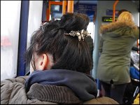 Womans hair with clip on bus P1230676.JPG