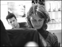 Woman reading with man behind G2 1170566.JPG