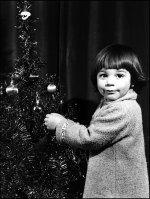 Kirsten with Christmas tree.jpg