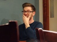 Bearded young man with glasses pleased expression HX90 00194.JPG