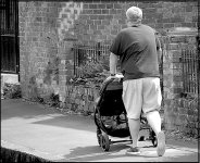 Exeter Man with push chair 45-150mm GX7 P1140774.JPG