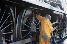 Engineer maintaing locomotive National Railway Museum York Canon 10D 4675.JPG