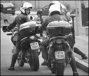 Three Polizei on motorcycles Innsbruck G2 1180103.jpg