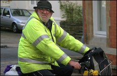 Older man yellow Jacket on motor bike 10D CAN_5619.jpg