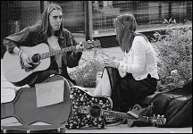 Couple playing guitar in street A46500 Eos 650 12.jpg