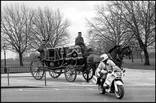 Hyde Park royal coach and police motorcycle Leica M3.jpg Hyde Park royal coach and police motorcycle Leica M3.jpg