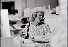 Woman in shop looking over her spectacles OM1 1993 04-08 copy.jpg