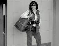 Woman waiting at bus station Exeter 100-400 G9 P1014568.jpeg Woman waiting at bus station Exeter 100-400 G9 P1014568.jpeg