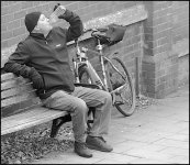 Man on bench drinking from Can Heavitree Rd D60_4296.JPG