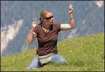 Austrian paraglider explaining her sport on mountainside above Seefeld D200 B7380.JPG