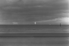 Cloudy with sunlit windmills.jpg Cloudy with sunlit windmills.jpg