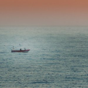 Isolated boat off the coast of Cromer