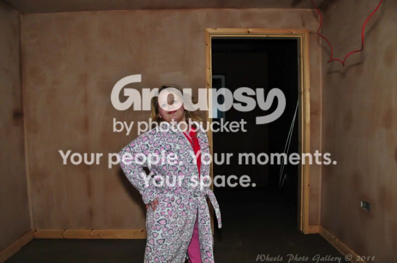 MollyPosinginmynewbedroom.jpg