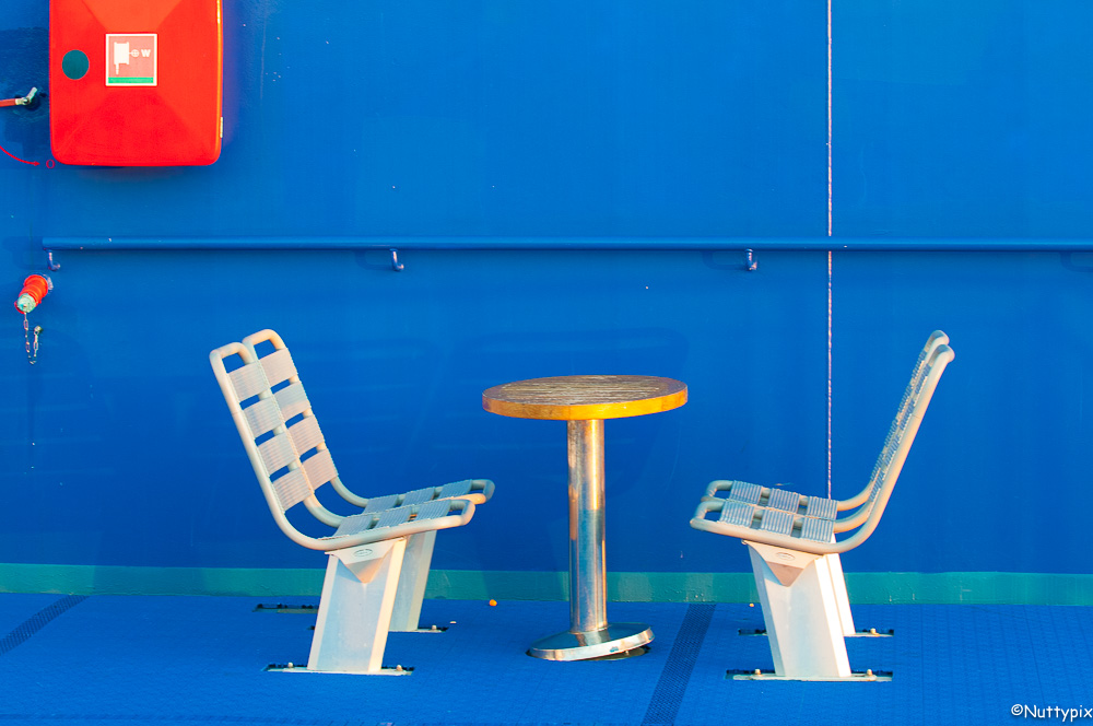 TP_empty_chairs_table_on_ferry.jpg