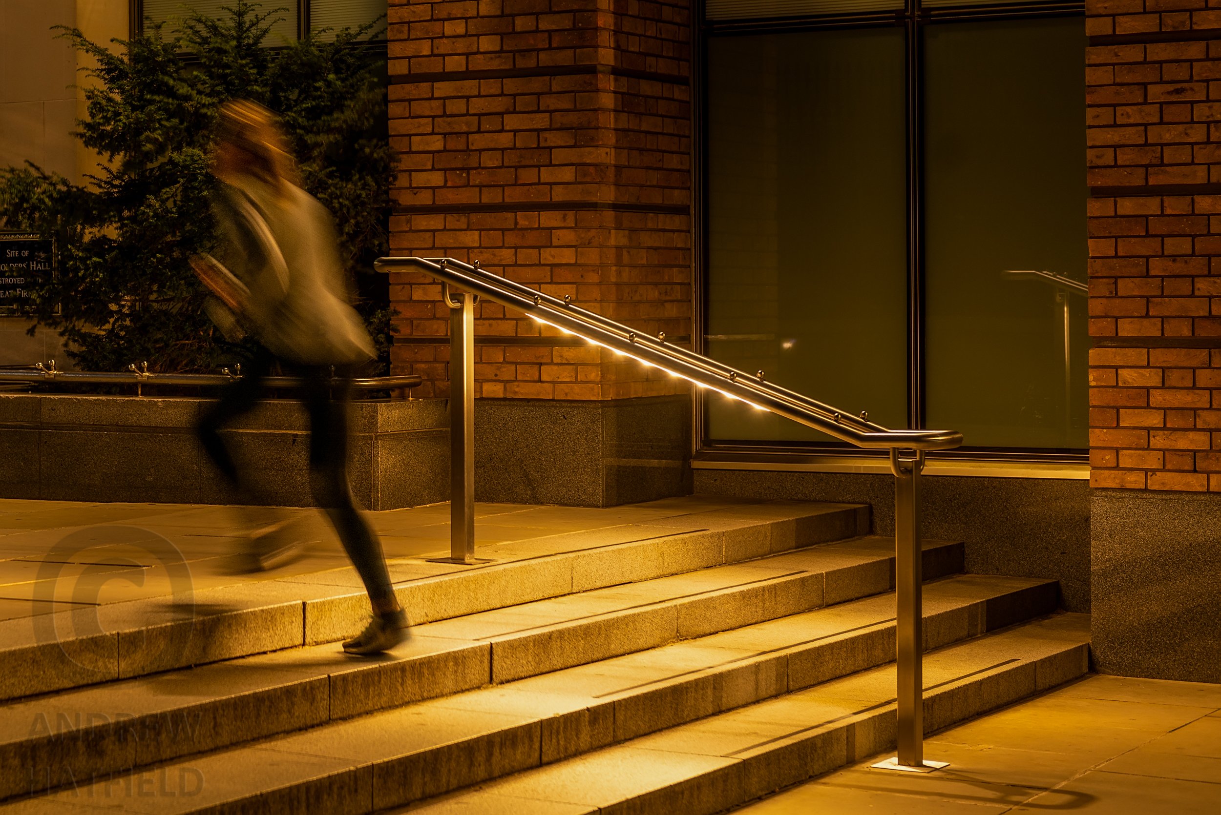Led+illuminated+garda+handrail+on+saint+peters+hill+london+framed+by+motion+blurred+jogger+AH8_8724+A.jpg